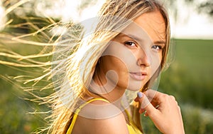 Portrait of young  woman on a spring/summer sunny day