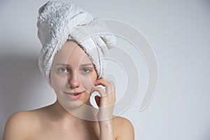 Portrait of a Young Woman with a Towel Wrapped around her Head