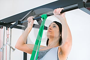 portrait of young woman training at the gym