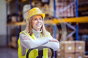 Portrait of a young woman warehouse worker.