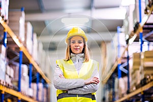 Portrait of a young woman warehouse worker.