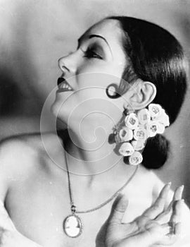 Portrait of a young woman wearing flowers in her hair