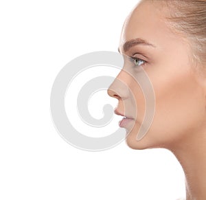 Portrait of young woman on white background