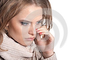 Portrait of young woman on white background