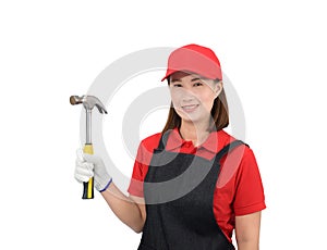 Portrait of young woman worker smiling in red uniform with apron, glove hand holding hammer isolated on white backround