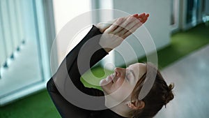 Portrait of young yogini woman meditate with hands in Namaste mudra
