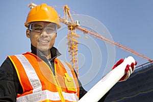 Portraite site manager with safety vest