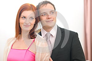 Portraits of formally dressed couple photo
