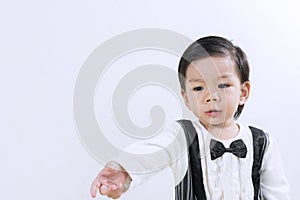 Portraits A Little Cute asian boy in Black and White suit.