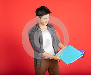 Portraits of people on the red background