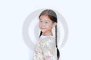 Portraits of smiling asian little child girl looking camera from backside isolated on white background