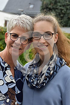 Portraits of a young woman and her mother