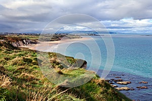 Portrush bay in County Antrim, Northern Ireland .