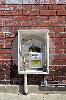 08/10/2020 Portsmouth, Hampshire, UK a pay as you go gas key meter on the side of a house