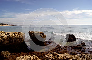 Portugal Albuferia. Rocks, sandy beachs and the Atlantic Ocean.