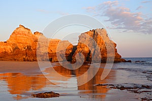 Portugal, Algarve, PortimÃÂ£o, Praia do Vau. Sandy beach and cliffs. photo