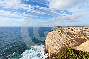 Portugal. Beautiful landscape of the Atlantic Ocean rocky coast in the Algarve photo
