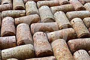 Portugal cork wine. Corky background. Texture. Geometry. Oak. Material. Warm. Brown yellow black. Shadows. Holiday winedays sweet