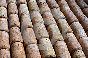 Portugal cork wine. Corky background. Texture. Geometry. Oak. Material. Warm. Brown yellow black. Shadows. Holiday winedays sweet