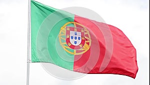 Portugal flag waves in the wind in slow motion