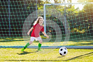 Portugal football fan kids. Children play soccer.