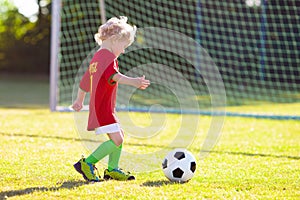 Portugal football fan kids. Children play soccer