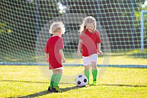 Portugal football fan kids. Children play soccer