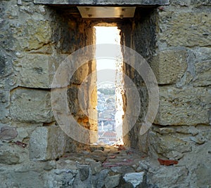 Portugal, Lisbon, 1 R. de Santa Cruz do Castelo, Saint George\'s Castle, city view through a loophole