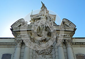 Portugal, Lisbon, Largo. dos Caminhos de Ferro, Lisbon Army Museum, coat of arms on the facade of the museum photo