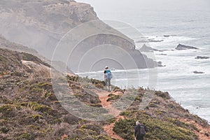 Portugal\'s western coastline of rocky cliffs and sandy beaches in the Odemira region. Wandering along the Fisherman trail photo