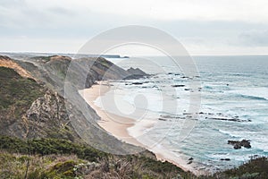 Portugal\'s western coastline of rocky cliffs and sandy beaches in the Odemira region. Wandering along the Fisherman trail photo