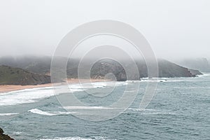 Portugal\'s western coastline of rocky cliffs and sandy beaches in the Odemira region. Wandering along the Fisherman trail photo