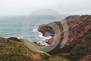 Portugal\'s western coastline of rocky cliffs and sandy beaches in the Odemira region. Wandering along the Fisherman trail photo