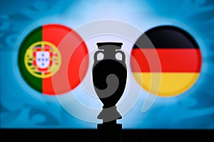 Portugal vs Germany, Euro National flags, and football trophy silhouette. Background for soccer match, Group F, Munich, 20. June