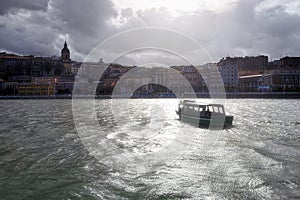 Portugalete with boat transporting people photo