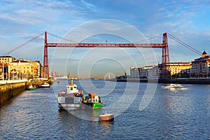 Portugalete and Las Arenas of Getxo with hanging bridge photo