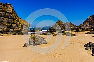 Portugals sandy beach on rocky Atlantic coast