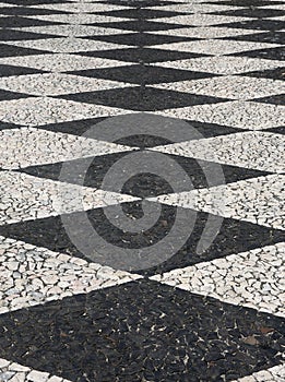 Portuguese black and white calcada cobbled paving Tomar, Portugal. UNESCO World Heritage Site.