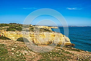 Portuguese coast in Benagil, Algarve, Portugal. Praia do Carvalho. Seven Hangging Valleys Trail photo