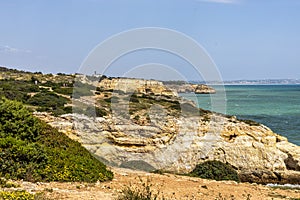 Portuguese coast in Benagil, Algarve, Portugal. Praia do Carvalho. Seven Hangging Valleys Trail photo