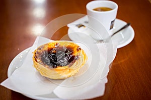 Portuguese Egg Tart And Coffee In Local Pastelaria photo