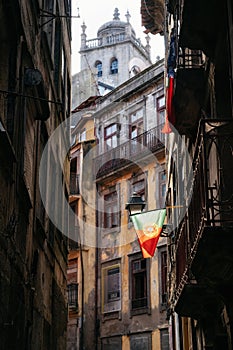 Portuguese flag on narrow street in Porto