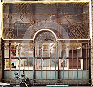 Portuguese Macao Lan Heong Kuok Teahouse Art Metal Iron Arts Macau Dim Sum Teapot Money Pattern Window Frame Style Graphic Design