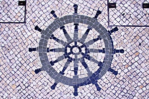 Portuguese Macau Mosaic Arts Craftsmanship Steering Wheel Sailboat Macao Mosaico Cobblestone Street Cultural Heritage Architecture photo