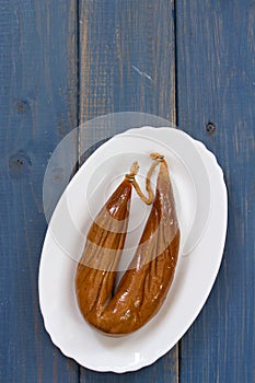 Portuguese sausage farinheira on white dish photo