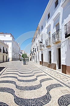 Portuguese sidewalk in square of Olivenza city photo