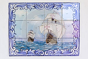 Portuguese traditional hand painted tin-glazed ceramic tilework, Azulejo photo