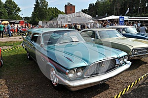 Old red car Crysler at the city festival in Porvo