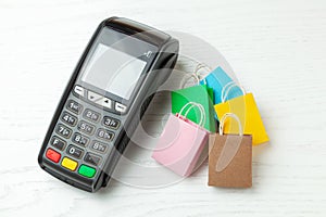 POS Payment terminal and shopping packages.