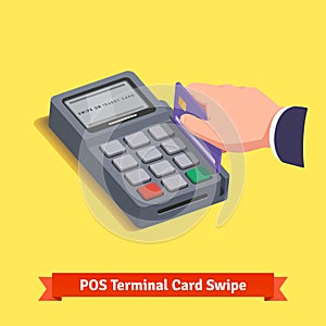 POS terminal transaction. Hand swiping credit card